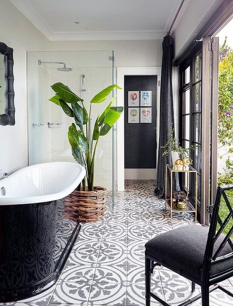 Black and white bathroom features a glossy black freestanding tub atop a black and white concrete tile floor which continues into the seamless glass glass shower which is placed next to the tub. White Concrete Floors, Concrete Tile Floor, Interior Design Minimalist, Bad Inspiration, Room Tiles, Outdoor Bathrooms, Trendy Bathroom, Tile Flooring, Bathroom Floor Tiles