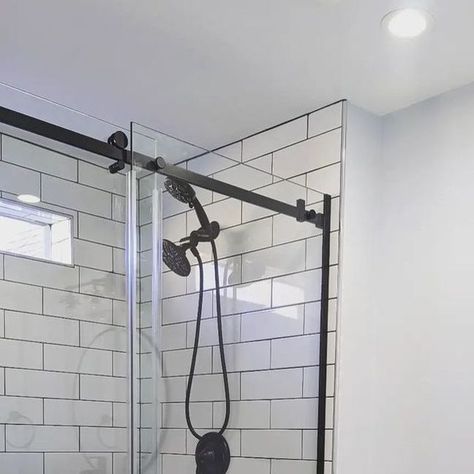 DreamLine Shower Doors on Instagram: "This modern bathroom design by @rjpharo.enterprises blends a classy black and white palette with modern elements, like our Enigma Air Shower Door! With contemporary matte black rollers and a stunning frameless design, the Enigma Air adds a pop of contrast against the white subway tiles while complementing the black base. ​

Make sure to tag @dreamlineshower when you post your shower remodel for a chance to be featured on our page! 

#dreamlineshowers #bathroomsideas #bathroombeforeandafter #remodelbathroom #bathroomdecor #remodelbathroom #bathroominspiration #bathroomremodelideas​
#bathroomdecorideas #bathroomdiys #bathroomremodel" Dreamline Shower Doors, Dreamline Shower Door, Dreamline Shower, White Subway Tiles, White Palette, Subway Tiles, Modern Elements, Shower Remodel, Shower Door