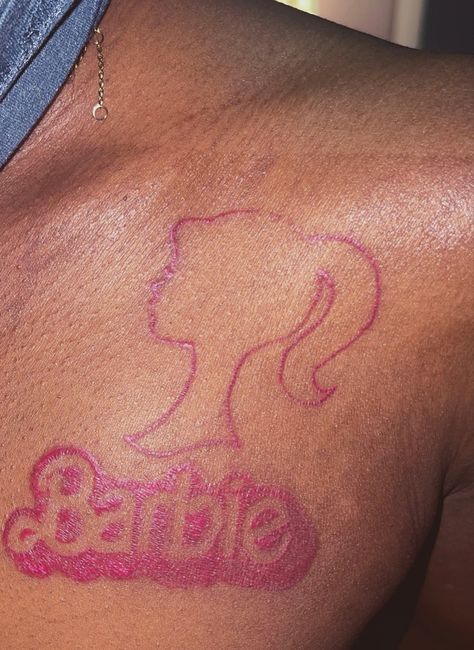 Barbie Head Tattoo, Barbie Doll Tattoo, Pink And Black Tattoo Ideas, Pink Tattoo On Brown Skin, Barbie Tattoo Ideas, Pink Tattoo Ink, Barbie Tattoo, Dark Skin Tattoo, Face Tats