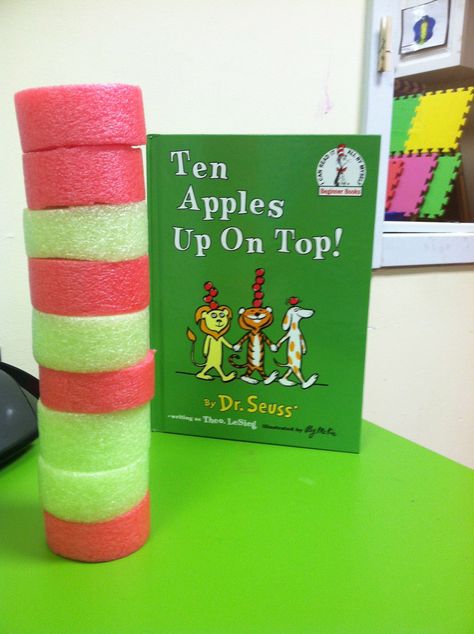 My two year old preschoolers loved stacking cut red and green pool noodles (pretending them to be apples) after reading Ten Apples Up on Top by Dr. Seuss! Preschool Apples, Ten Apples Up On Top, Tree Unit, September Lessons, Apple Week, September Ideas, Dr Seuss Preschool, Preschool Apple Theme, September Preschool