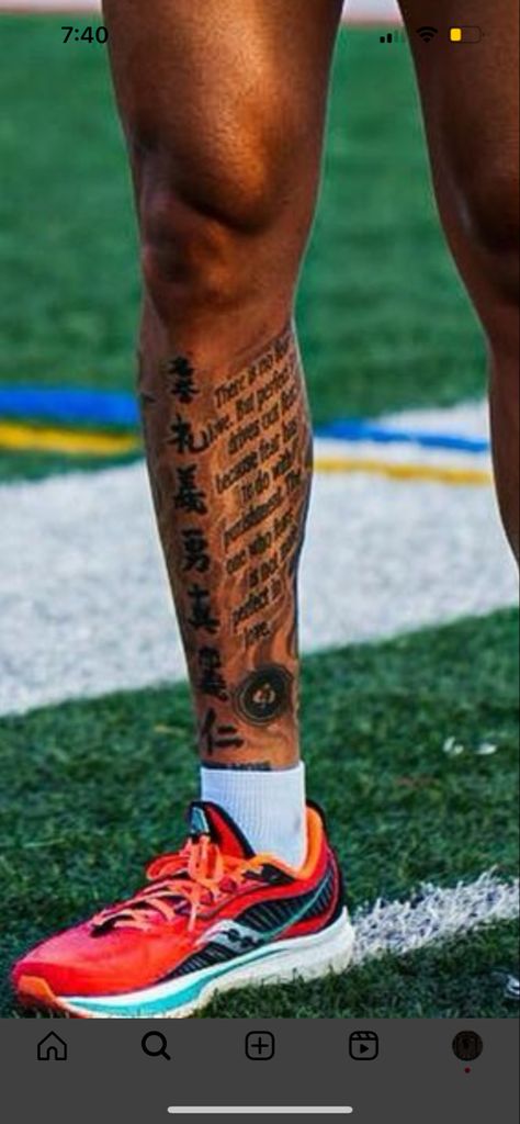 Good Leg Tattoos Men, Footballer Leg Tattoo, Outer Calf Tattoo Men, Calf Writing Tattoo, Leg Tattoo Ideas For Men Calves, Bible Verse Calf Tattoo, Inside Leg Tattoo Men, Black Leg Tattoo Men, Leg Peices Tattoos