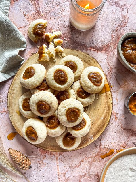 A classic cookie gets a seasonal update in these Snickerdoodle Thumbprint Cookies recipe. Traditional soft and chewy Snickerdoodles are rolled in a sugar-cinnamon mixture, and then an indent in the center of the cookie is filled with creamy pumpkin butter for an irresistible fall treat. Cinnamon Thumbprint Cookies, Snickerdoodle Thumbprint Cookies, Fall Thumbprint Cookies, Coffee Break Snacks, Cookies With Pumpkin, Chewy Snickerdoodles, Bundt Recipes, Thumbprint Cookies Recipe, Pumpkin Butter