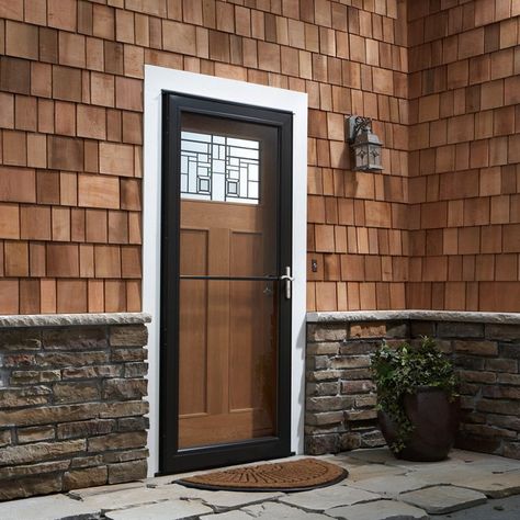 8 Series Retractable Screen Storm Door Wood Front Door With Storm Door, Storm Doors For Front Door With Side Lights, Brown Door Exterior With Storm Door, Wood And Glass Storm Door, Storm Doors For Front Door, Almond Storm Door, Best Storm Doors, Black Screen Door, Wood Storm Doors