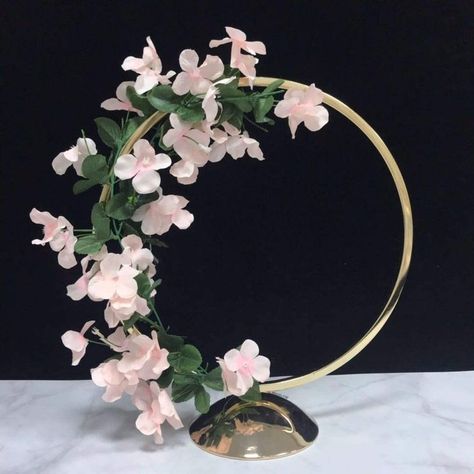 Hoop Centerpiece Stand Metal Floral Hoop Wedding Decor Size:20 Inch TallRUSTIC AND VINTAGE CENTERPIECES: (FLOWER IS NOT INCLUDED) Height 16'', Circle Diameter 13.8''. Comes with modern style, it is gorgeous and makes your weddings, parties beautiful and unique. HIGH QUALITY METAL: The flower stand is made of high quality metal material which are durable and stable. Hoop Wedding Decor, Floral Hoop Wedding, Hoop Centerpiece, Centerpiece Stand, Wedding Vase Centerpieces, Metal Wedding Arch, Centerpiece Vase, Felt Flower Wreaths, Vintage Centerpieces