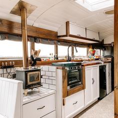 Van Conversion Kitchen, Short Bus Conversion, School Bus Tiny House, School Bus Camper, School Bus House, House Ceiling, Bus Living, Short Bus, School Bus Conversion