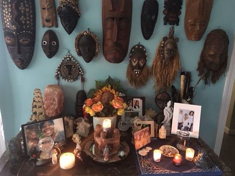 I didn’t grow up with an altar in my home, but unconsciously created one in the first apartment that I lived in by myself. I’ll never forget my mother who, while visiting, noted that my window altar called in the four directions. At the time, my altar simply had 4 glasses of water in different … African Altar, Ancestral Alter Ideas, Family Alter, Ancestor Altar Aesthetic, Alter For Ancestors, Ancestor Altar Ideas, Divination Altar, Altar For Ancestors, Ancestors Altar