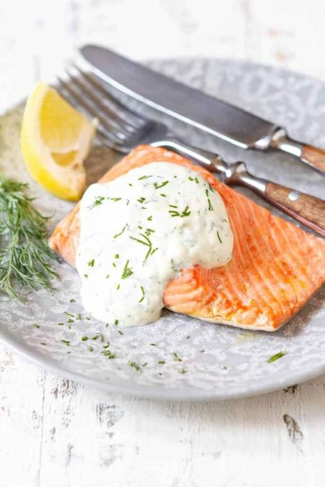 Ina Garten's Poached Salmon is a delightful, elegant dish that's both simple to prepare and incredibly flavorful. Sauce For Cod, Lemon Sauce For Fish, Salmon With Dill Sauce, Creamy Lemon Dill Sauce, Baked Salmon Filets, Sauce For Fish, Salmon With Dill, Salmon Dill, Lemon Dill Salmon