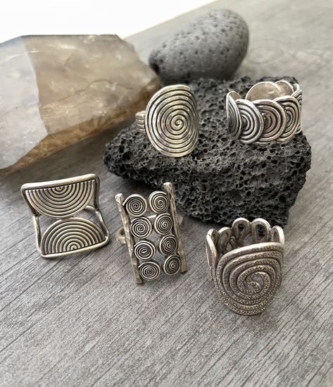 Five different designs of rings, all inspired by spirals. Each has a unique design with either one spiral, half spirals or multiple spirals. All these are made with sterling silver. In the pictures you will see a number that represents each ring for you to choose from. Ring #1- A design of multiple spirals, perfect as thumb ring also. This ring is size adjustable, the smallest size is 7.75 and can be open to bigger sizes, but this will create a gap, because the ring is the same all around, you c Multiple Silver Rings, Cool Rings, Rings Chunky, Rings Trendy, Ring Aesthetic, Cool Accessories, Chunky Silver Rings, Trendy Rings, Aesthetic Rings