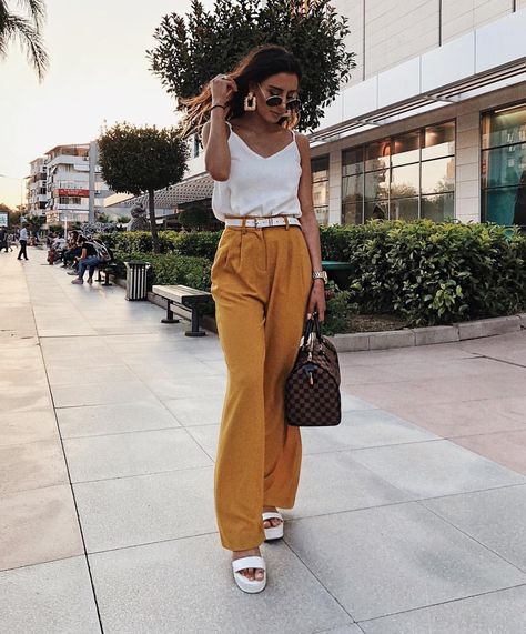 Mustard pants and white cami Mustard Pants Outfit, Swag Pants, Yellow Pants Outfit, Mustard Outfits, Mustard Pants, Track Pants Outfit, Wide Leg Pants Outfit, Yellow Pants, White Cami