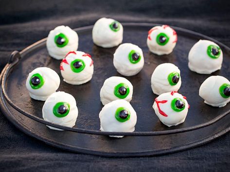 Cake Eyeballs Recipe | Ree Drummond | Food Network Halloween Potluck, Recipe Cake, Food Network Canada, Food Network Magazine, Rice Crispy Treats, Ree Drummond, Yellow Cake Mixes, Halloween Desserts, Halloween Food For Party