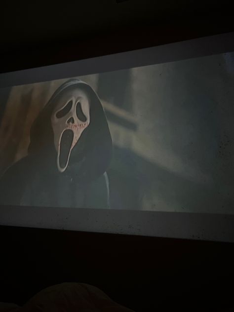 Scream, movie, scream movie, ghostface, projector , movie projector, movie night, halloween movie, halloween movie night, halloween aesthetic Halloween Film Aesthetic, Fall Aesthetic Movie Night, Watching Scream Aesthetic, Spooky Movie Night Aesthetic, Horror Movie Night Aesthetic, Watching Horror Movies Aesthetic, Scream Movie Night, Regan Core, Scream Movie Aesthetic