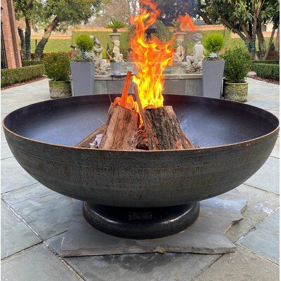 17 Stories The Vulcan Fire Pit is an understated focal point, that forms the ultimate conversation piece and sets the stage for hours of warmth. 17 Stories manufactures and utilizes industrial strength tank heads for the bowls used in their fire pits. Tank heads are the end caps on cylindrically-shaped pressure vessels. They generally comply with ASME standards because of the high pressures they must withstand for use with gas storage tanks and reactors. Size: 20" H x 48" W x 48" D | 17 Stories Magnetic Drill, Steel Fire Pit, Burning Fire, Wood Burning Fire Pit, Storage Tanks, Wood Burning Fires, Steel Wood, Fire Bowls, Wooden Decks