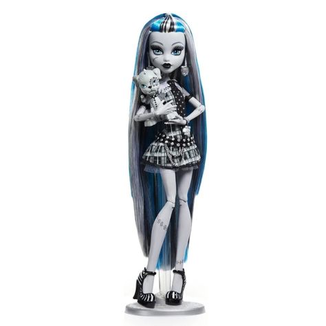 Features & Details Monster High Is Back In Black And White! The Creepy Cool Reel Drama Collection Gives A Theatrical Flair To The Original Ghouls. In This Behind The Screams Look, Frankie Stein Doll’s Extra-Long Hair Swishes Behind Her -- Accented By Signature Blue Highlights, Of Course! This Mon-Star Is Voltageous In A Plaid Mini Dress With Strappy Pumps. With Her Fearsome Dog Sidekick Watzie In Tow, They Are Ready For All Manner Of Thrills! Frankie Stein Shows Off A Freaktacular Movie Poster D