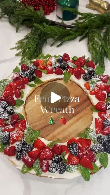 Linda | Make Life Extra | Fun Recipes + Home Finds + DIY on Instagram: "This fruit pizza wreath makes the perfect holiday dessert. It is light and refreshing, and looks festive. Your guests will love the cookie crust layered with sweet cream cheese and fresh berries.   Recipe~ -1 bag of sugar cookie mix (like Betty Crocker) or 1 tube of refrigerated dough  -1 (8 oz) pkg PHILADELPHIA Cream Cheese, softened -1/3 cup granulated sugar -2 Tablespoons of milk -1/2 tsp vanilla extract  -Raspberries , blackberries, blueberries & strawberries -fresh mint for wreath garnish  Grease your pizza pan.  Preheat your oven - per cookie mix. If you’re making your sugar cookie crust from a bag - prepare as per directions on the back of the bag. Spread your cookie mixture evenly on your pizza pan.  In a mixin Holiday Fruit Pizza, Fruit Pizza Sugar Cookie Christmas, Fruit Pizza Christmas Wreath, Christmas Fruit Pizza Wreath, Christmas Dessert Pizza, Fruit Pizza Wreath, Christmas Fruit Pizza, Sugar Cookie Wreath, Christmas Wreath Dessert