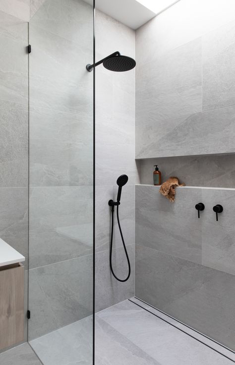 Bathrooms with large format tiles are beautiful and practical, with large seamless surfaces and less grout lines to clean.
But planning is key to ensure good fall to your shower, without the need for numerous tile cuts.
Click to read our blog on how to plan for this for your new bathroom, with Lauxes Grates Linear Floor Wastes.

Follow us on Instagram and Pinterest for all the latest home, reno and design tips, trends and products. Large Tile Bathroom, Large Shower Tile, Drømme Bad, Makeover Kamar Mandi, Large Tiles, Bilik Air, Bathroom Inspiration Modern, Bad Inspiration, Bathroom Design Inspiration