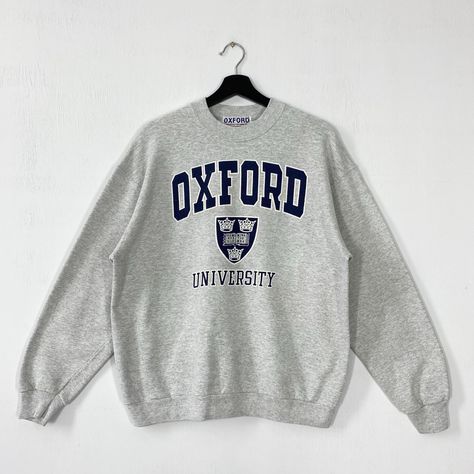 Vintage 90s Oxford University Sweatshirt Oxford Crewneck Oxford University Sweater Pullover Oxford Embroidered Logo Grey Medium 𝐁𝐫𝐚𝐧𝐝 :- Oxford University  𝐒𝐢𝐳𝐞 𝐓𝐚𝐠 :- Large 𝐒𝐢𝐳𝐞 𝐑𝐞𝐜𝐨𝐦𝐦𝐞𝐧𝐝 :- Fits for Medium Manual Measurement :- 𝐖𝐈𝐃𝐓𝐇 (armpit to armpit) :- 22.5 inches / 57cm 𝐋𝐄𝐍𝐆𝐓𝐇 (shoulder to end of garment) :- 26 inches / 66cm 𝐂𝐨𝐧𝐝𝐢𝐭𝐢𝐨𝐧 :- Good Condition 8/10.                      - Minor Defect Stain Refer Picture.                      - Colors Might Be Different Due To Lighting. - All items are VINTAGE which show some signs of wear and tear FEDEX EXPRESS = 3-6 business day arrived Oxford Logo, University Sweater, University Sweatshirts, Oxford University, Fedex Express, Sweater Pullover, Be Different, Size Tag, Wear And Tear