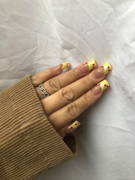 Yellow french with cherrys 🍒#nails #cherrynails #yellow #gelnails #mediumnails #ringsjewelry #aesthetic #aestheticnails Yellow French Tip With Cherries, Yellow Nails With Cherries, Yellow Cherry Nails, Yellow And Red Nails, Red And Yellow Nails, Yellow French Nails, Yellow French Tip Nails, Yellow French Tip, Acrylic Nails Yellow