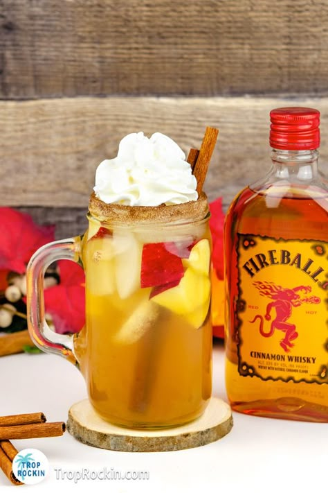 Fireball Cider Cocktail, Carmel Apple Cider Fireball, Apple Cider Cocktail With Fireball, Fireball And Apple Cider, Fireball Apple Cider Sangria, Fire Ball Drinks Cocktails, Apple Cider Fireball Drink, Apple Cider With Fireball, Apple Cider And Fireball Drink