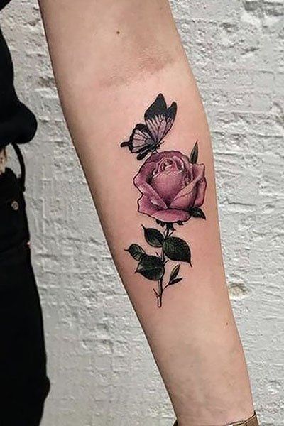 35 Gorgeous Rose Tattoo Ideas for Women - The Trend Spotter A Rose Tattoo, Butterfly Sitting, Delicate Flower Tattoo, Rose And Butterfly Tattoo, Unique Butterfly Tattoos, Butterfly Tattoo On Shoulder, Rose Tattoos For Women, Butterfly Tattoos For Women, Black Rose Tattoos