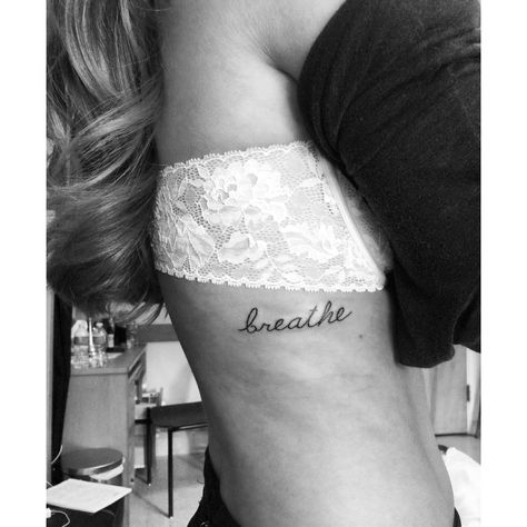 Breathe tattoo on the ribs Breathe Rib Tattoo, Just Breathe Tattoos For Women Ribs, Tattoo For Women Quotes, Divorce Healing, Ewings Sarcoma, Just Breathe Tattoo, Small Rib Tattoos, Small Sister Tattoos, Tattoo Tiny