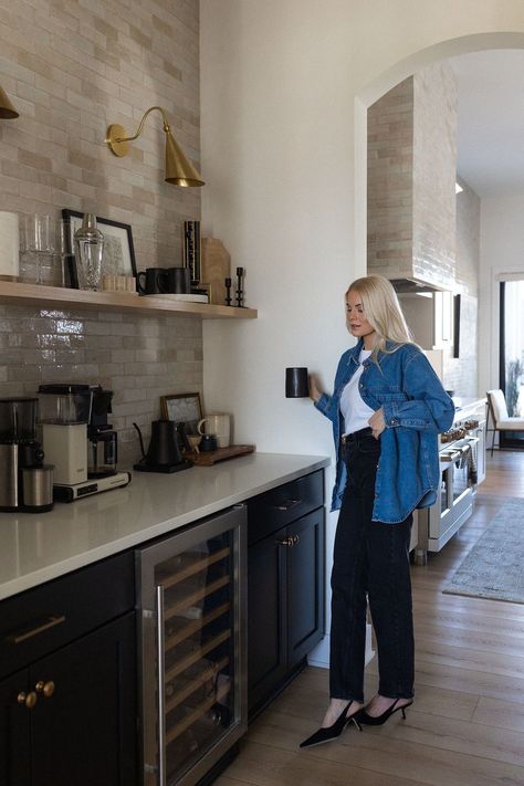 One of my favorite little nooks in our new house is our Butler’s Pantry! I love that this space is both functional and aesthetically pleasing! We continued the tile from the wall in our kitchen and it look so cohesive. We used a natural wood open shelving unit, giving us plenty of storage and countertop space. We also added a wine cooler — perfect for entertaining guests or just enjoying a glass after a long day at work! Tap to see all the details of this space and my coffee bar must haves! Coffee Bar Must Haves, Bar Must Haves, Pantry Coffee Bar, Kitchen With Open Shelving, Kathleen Post, Coffee/wine Bar, Open Shelving Units, Butler’s Pantry, Garage Remodel