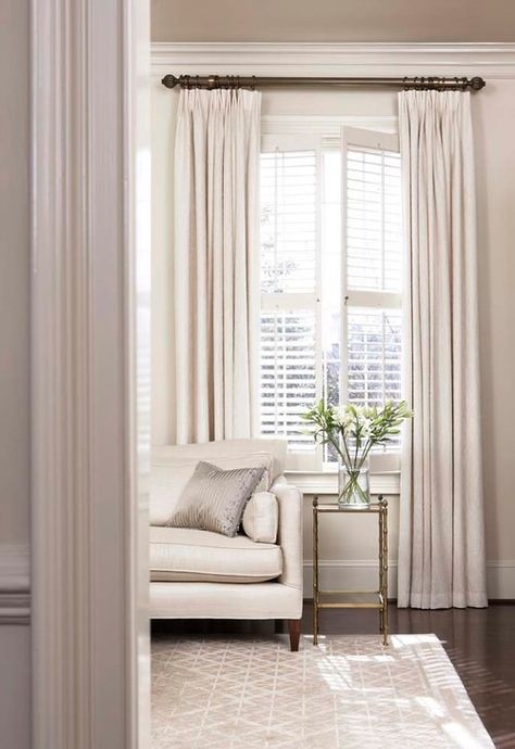 Pairing Shutters with Curtains | Blog Drapes With Shutters, Curtains With Shutters Living Room, Drapes Over Shutters, Curtains Over Shutters Bedrooms, Interior Shutters With Curtains, Shutters With Curtains Living Room, Shutters Decor Living Room, White Shutters Living Room, Shutters And Curtains Together