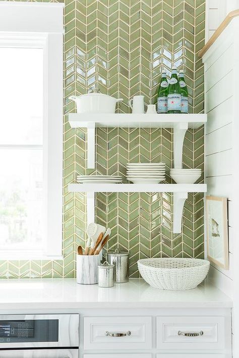 Coastal Living Showhouse - White and green kitchen features white cabinets paired with white quartz countertops and a ceiling height green herringbone tiled backsplash lined with stacked white shelves with corbels. Herringbone Tile Backsplash, Subway Tile Backsplash Kitchen, Kitchen Ikea, Subway Tile Kitchen, Herringbone Backsplash, Tile Trends, Herringbone Tile, Gorgeous Kitchens, Kitchen Tiles Backsplash