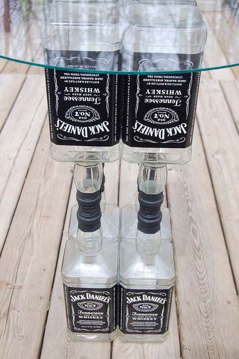 Fun DIY Ideas Made With Jack Daniels - Recipes, Projects and Crafts With The Bottle, Everything From Lamps and Decorations to Fudge and Cupcakes | Upcycled Jack Daniels Liquor Bottle Table Idea | http://diyjoy.com/diy-projects-jack-daniels Festa Jack Daniels, Jack Daniels Recipes, Fun Diy Ideas, Alcohol Bottle Crafts, Jack Daniels Bottle, Diy Joy, Liquor Bottle Crafts, Hunting Camp, Lounge Bar