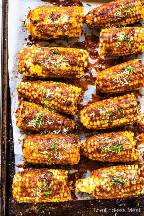 PIN TO SAVE FOR LATER! Smoky parmesan corn on the cob is the ultimate summer recipe. The corn is coated in a garlicky parmesan butter then grilled (or roasted) until deliciously smoky perfection. It's a super easy to make and healthy side dish that everyone loves! #theendlessmeal #parmesancorn #parmesancornonthecob #cornonthecob #corn #cornrecipes #cornonthecobrecipes #bbqrecipes #healthyrecipes #easyrecipes #summer #summerrecipes #vegatarian #vegan #glutenfree British Dessert Recipes, Parmesan Corn On The Cob, Corn Recipes Cob, Parmesan Corn, Parmesan Butter, Bbq Corn, Juicy Baked Chicken, Vegetarian Bbq, Buttered Corn