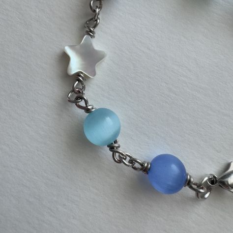 custom order for essy! she asked for a light blue bracelet, and i ofc threw in some extra goodies for being my first order🩵🪼 🛒dm for your own custom!! this bracelet was $10 + $5 shipping:) ⋆. ݁⭒ #beadedjewelry #handmadejewelry #customorder Light Blue Bracelet, Blue Bracelet, First Order, Blue And Silver, Custom Orders, Beaded Jewelry, Silver Bracelet, Handmade Jewelry, Light Blue