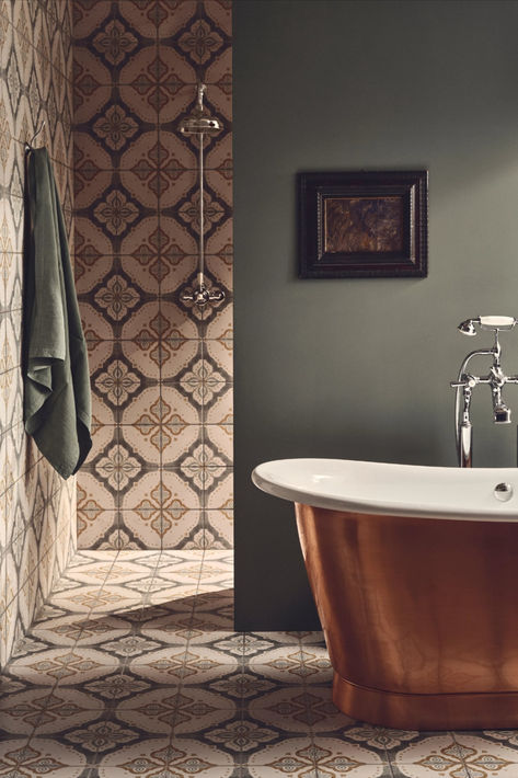 There are few things as lovely as relaxing in the bath, and when that bath is made from copper or polished nickel and warms up instantly, it is all the better. A beautiful copper bath paired with tiles that have been inspired by the age-old craft of Indian block printing in the Pink City of Jaipur makes any room look elegant. Black Shower Screen, Fired Earth Bathroom, Modern Traditional Bathroom, Indian Bathroom, Copper Bath, Patterned Tiles, Victorian Tiles, Pink City, Fired Earth