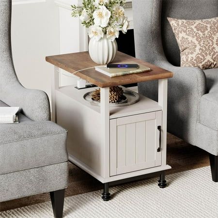 Keep your bedroom essentials within arms reach with the nightstand with charging statioin. Not only this charming table works great as a bedside table, but a sofa side table to serve your drinks and snacks in the living room, or a file cabinet to streamline your paperwork in the office. The wihite end table featured with rustic white wood body, oak table top and special gourd-shaped legs which looks modern and elegant. Well matches with your farmhouse style home decor and bring you fashional and Storage Cabinet For Bedroom, Cabinet For Bedroom, Side Tables For Bedroom, Table With Charging Station, Farmhouse End Tables, Oak Table Top, Large Storage Cabinets, Living Vintage, Farmhouse Side Table