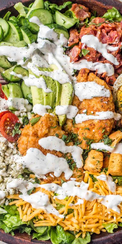 A light and hearty Cobb Salad recipe made with crispy chicken tenders, bacon, tomatoes, cucumbers, croutons and tossed in a delicious homemade dressing. Chicken Tender Salad, Salad Cobb, Sauce For Vegetables, Salad Meals, Ranch Dressing Recipe Homemade, Classic Cobb Salad, Chicken Tomatoes, Cobb Salad Recipe, Clean Foods