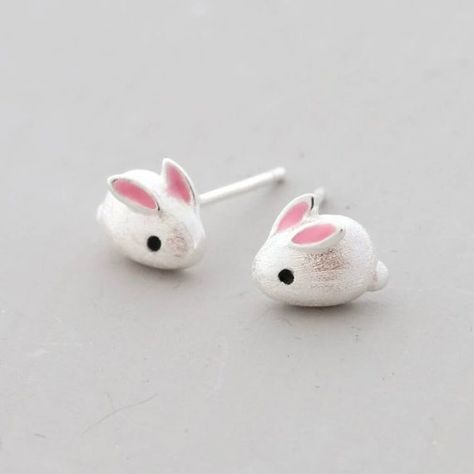 925 Sterling silver cute bunny rabbit earring studs A pair of sweet bunny earrings made in sterling silver with pink enamel details. With two long pink ears, black eyes and little tails, the design creatively keeps all the cuteness of a bunny rabbit. A lovely gift for Easter, Christmas and Birthdays! These studs are medium-sized, however, they are perfect for young ones who have had their ears pierced for the first time. Also, if you have several piercings, you may wear these earrings with our o Pink Clay Earring Ideas, Animal Earing, Rabbit Earring, Cute Earrings Studs, Polymer Clay Bunny, Clay Bunny, Bunny Jewelry, Cute Bunny Rabbit, Rabbit Jewelry