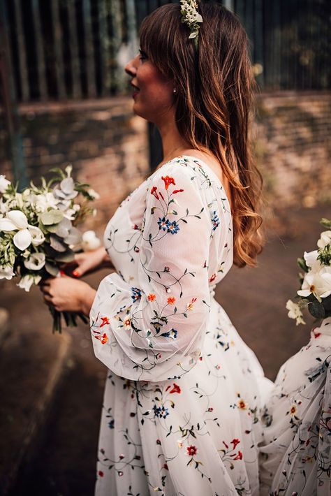 Crypt on The Green wedding with bride wearing embroidered wedding dress from Sassi Holford White Dress Embroidered Flowers, Flower Embroidered Wedding Dress, Bridesmaid Dresses Bright, Colourful Wedding Dress, Floral Embroidered Wedding Dress, Vibrant Wedding Flowers, Mermaid Bride Dresses, Embroidery Wedding Dress, Lace Top Wedding