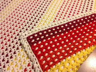 Reversible Baby Afghan pattern by Carole S. Crochet Chevron Blanket Pattern Free Red Hearts, Red Heart Blanket Crochet Pattern, Crochet Afghans Easy, Rainbow Afghan, Pink Polka Dot Blanket, Baby Afghan Patterns, Crochet Granny Square Afghan, Crochet Blanket Afghan, Baby Afghan Crochet