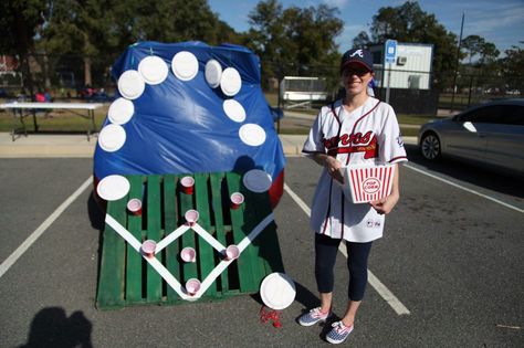 Baseball trunk or treat. Baseball Halloween. We used white paper plates & drew on red stitching. The kids got "3 strikes" to land a mini baseball (ping pong ball) in the cups. They stood in the better's box we drew on the ground. Trunk Or Treat A League Of Their Own, Trunk Or Treat Ideas For Cars Baseball, Baseball Trunk Or Treat Ideas For Cars, A League Of Their Own Trunk Or Treat, Trunk Or Treat Baseball Theme, Baseball Theme Trunk Or Treat, Trunk Or Treat Baseball, Sports Trunk Or Treat, Baseball Trunk Or Treat