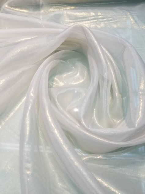 "Metallic Chiffon White/silver and White/Gold 100% Silk Chiffon 54\" wide. Usable for Apparel and interior designing. End Uses: Apparel,Dresses,Jackets,Slacks,Suits, decorations, blouse, dress etc. Fabric is sold by the yard - to order, select the desired quantity of yards from the drop-down list, each yard will show in your shopping cart as an item but they will ship as one continuous piece Width : 45\" inches Color : Orange Thank you for your coming! Please read policy before placing an order. White Fabric Texture, Iridescent Fabric, Silk Chiffon Fabric, Silver Silk, Silk Chiffon Dress, Silver Fabric, Interior Designing, White Chiffon, Fabric Suppliers