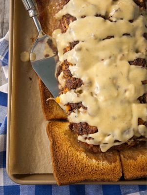 A cheesy version of the classic, with a mushroom sauce. Paula Deen Cheeseburger Meatloaf, Paula Deen Meatloaf Recipes, Paula Deen Meatloaf, Cheeseburger Meatloaf Recipes, Cheesy Meatloaf, Cheeseburger Meatloaf, Paula Deen Recipes, Man Food, Paula Deen