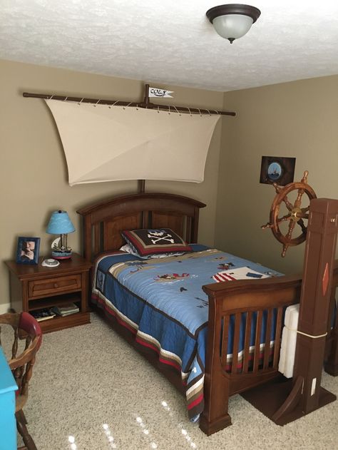 Pirate Bedroom w/ Custom Sail/Steering Wheel Pirate Room Ideas, Pirate Themed Room, Pirate Theme Bedroom, Pirate Cabin Bedroom, Pirates Room Decor, Pirate Themed Bedroom, Cool Boys Bedroom, Pirate Bedroom Decor, Pirate Ship Bedroom