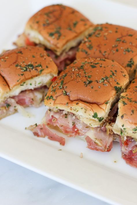 Hawaiian Roll Sliders Muffaletta, Muffaletta Sandwich Sliders, Mardi Gras Sandwiches, Muffalata Sliders, Mini Muffaletta Sliders, Louisiana Party Food, Cajun Sliders, Muffaletta Sliders, Muffuletta Sliders