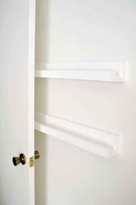 Fix That Awkward Space Behind the Door with These Narrow Shelves Floating Shelves Behind Door, Over Door Storage Hallway, Floating Shelf Behind Door, Space Saving Wall Shelves, Using Wall Space For Storage, Space Behind Door Bedrooms, Behind Door Decor Bedroom, Slim Wall Storage, Narrow Storage Behind Door