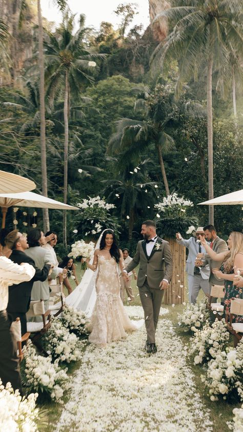 Hannah Rosser | welcome party of a lifetime at Rayavadee Resort, Thailand | Instagram Wedding Ceremony Flower Arrangements, Tropical Wedding Ceremony, White Flower Petals, Thailand Instagram, Wedding Ceremony Setup, White Wedding Ceremony, Thailand Wedding, Welcome Party, Wedding Exits