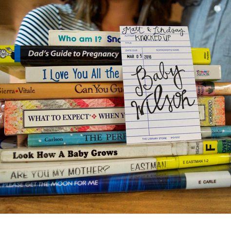 Cute Library Themed Pregnancy Announcement #pregnancyannouncement Book Themed Pregnancy Announcement, Bookish Pregnancy Announcement, Bookish Baby Announcement, Book Baby Announcement, Book Pregnancy Announcement, Literary Nursery, Nerdy Nursery, Pregnancy Date, Book Themed Nursery