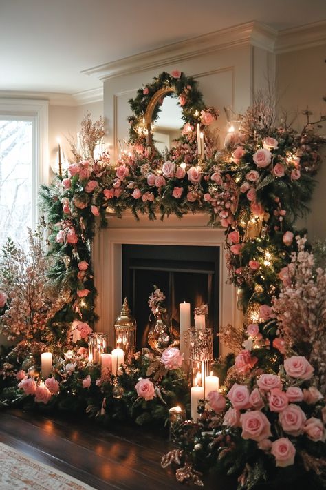 A cozy fireplace decorated with a lush greenery garland, candles, and pink roses for a festive holiday atmosphere. Decorating Ideas For Mantels, Valentine Fireplace Mantel, Around Fireplace Decor, Inside Fireplace Decor Ideas, Valentines Fireplace Decorations, Fireplace Decor Ideas Living Rooms, Mantel Decorating Ideas Christmas, Cozy Christmas Mantle, Fireplace Centerpiece