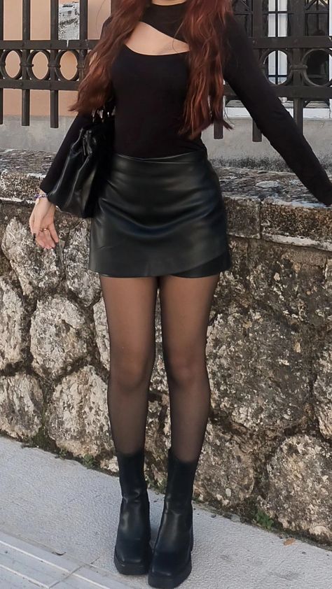 How To Style A Black Skirt For School, Black Mini Skirt And Black Tights Outfit, Boots Outfit Night Out, Black Leather Tights Outfit, Winter Skirts And Boots, Black Mini Skirt Aesthetic, Black Mini Skirt Winter Outfit, Skirt Tights Boots Outfit, Leather Skirt Aesthetic