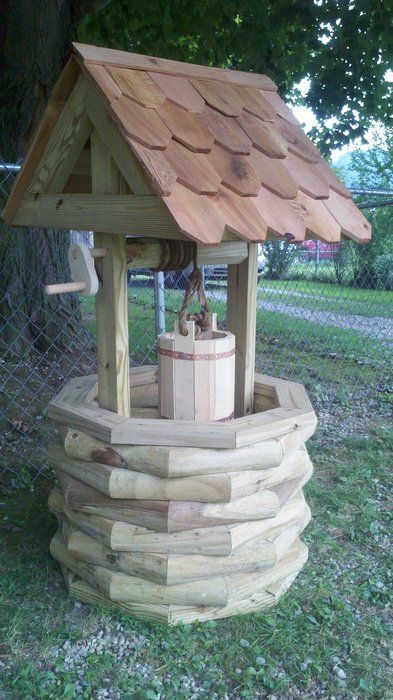 Wishing Well Plans How To Build, Hide Water Well In Yard, Wishing Well Decorating Ideas, Diy Wishing Well Easy, Well Head Cover Ideas, Wishing Well Ideas, Landscape Timber Crafts, Wishing Well Garden, Diy Wishing Wells