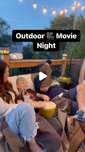 Amanda Albrecht Illinois Realtor + Content Creator on Instagram: "Outdoor Movie 🎥 Night! This was so fun for the whole family and easy to set up. 

I used no hole vinyl hooks to easily attach the cloth screen to the back of the home. 

Next we set up our mini projector which was under $80 and only needed an extension cord and your phone to operate.

Can’t forget the candy and popcorn 🍿 

Save for later and follow @sellingthesuburbs for more! 
.
.
.
#home #family #movienight #outdoormovie #outdoormovienight #familymovienight #familyactivities #kidapproved #datenight #howto #outdoorspaces #realtor #realestate #momsofinstagram #momstyle #napervillemoms #momsofboys #momsofplainfield #bestofplainfield #sellingthesuburbs #realtoring #realtormom #outdoorentertaining #diyoutdoors #homesweethome Movie Trailer Ideas, Outdoor Movie Projector Set Up, Movie Night Ideas Outdoor, Outdoor Projector Ideas, Outdoor Movie Night Ideas, Outside Projector, Realtor Content, Outdoor Projector Screen, Outdoor Movie Night