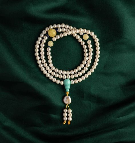 Buddhist rosary/念珠 made with 108 cultured pearls, turquoise guru bead/三通珠 and amber beads as dividers. Photo extracted from TaoBao. Buddhist Rosary, Chinese Bracelet, Decoration Pieces, Mala Jewelry, Buddhist Prayer, Chinese Jewelry, Decoration Piece, Amber Beads, Mala Beads