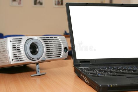 Laptop with the projector on office table. Miss Call, Wireless Projector, The Projector, Laptop Display, Hd Quality Video, Website Ideas, Preventive Maintenance, Home Theater Projectors, Projector Screen